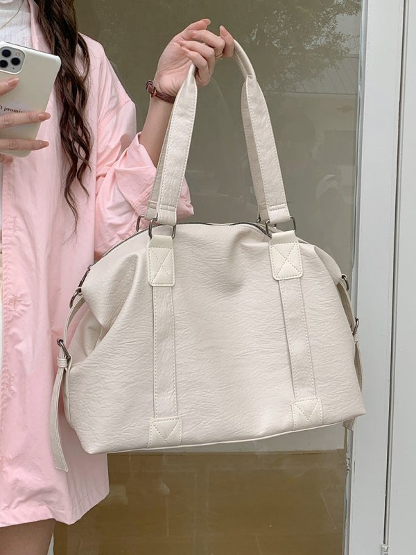 Korean Casual Portable Large-capacity Luggage Bag $45.50 Dana Fashion Color: Beige Women's Bags Product information: Lining text: Polyester Applicable scenario: leisure travel Color: black, cream white, brown Outer bag type: split pocket Hardness: soft Ma