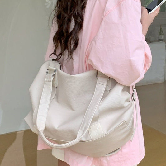 Korean Casual Portable Large-capacity Luggage Bag $45.50 Dana Fashion Color: Beige Women's Bags Product information: Lining text: Polyester Applicable scenario: leisure travel Color: black, cream white, brown Outer bag type: split pocket Hardness: soft Ma