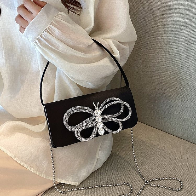Ladies Bow Handbag $58.68 Dana Fashion Color: Black Women's Bags Product information: Lining texture: Polyester Applicable scenario: Daily matching Color: white, black, Rose, pink, orange, green, blue, purple Outer bag type: Sandwich pocket Hardness: medi