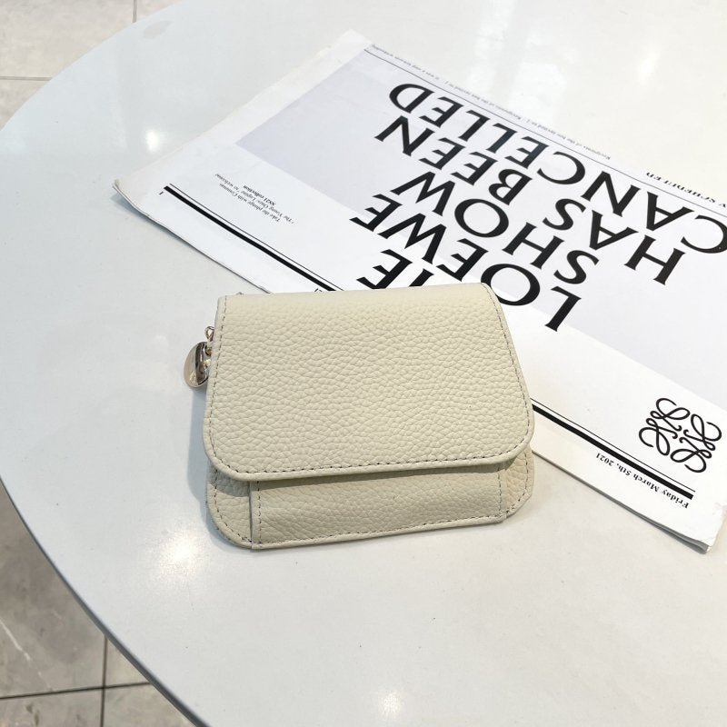 Ladies Card Holder Ins Cowhide Korean Style Mini Multi-card Slot Coin Purse $29.00 Dana Fashion Color: White Women's Bags Product information: Pattern: solid color Lining texture: genuine leather Applicable scenarios: Daily matching Color: Black, Almond G