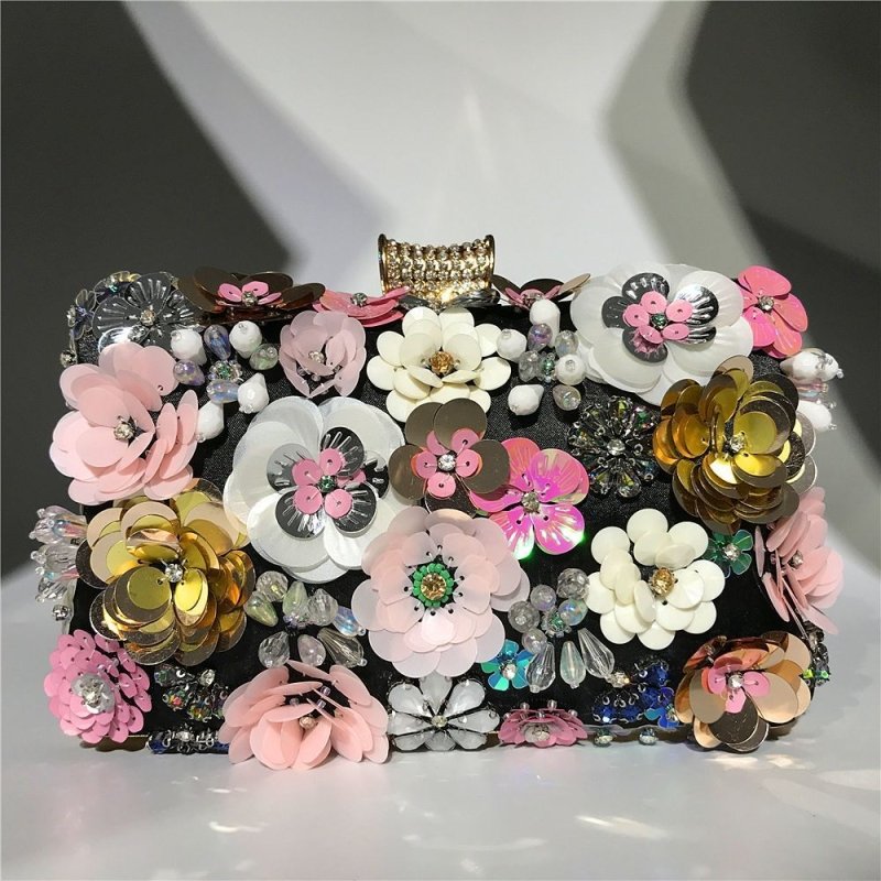 Ladies handmade colorful flower beaded bag $72.26 Dana Fashion Color: Black Women's Bags Ladies handmade colorful flower beaded bag Material: Silk Fabric texture: cotton Style: women's clutch Opening method: lock Internal structure of the bag: mobile phon