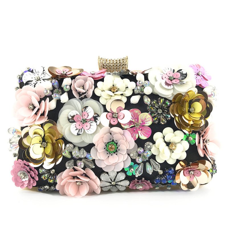 Ladies handmade colorful flower beaded bag $72.26 Dana Fashion Color: Black Women's Bags Ladies handmade colorful flower beaded bag Material: Silk Fabric texture: cotton Style: women's clutch Opening method: lock Internal structure of the bag: mobile phon