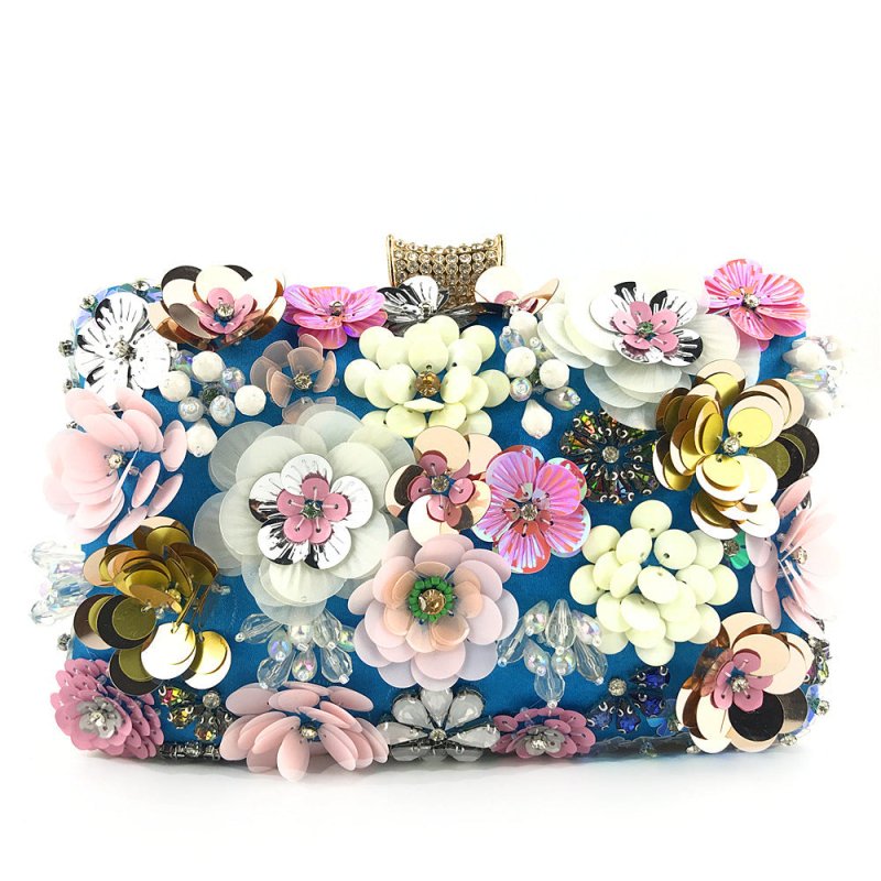 Ladies handmade colorful flower beaded bag $72.26 Dana Fashion Color: Blue Women's Bags Ladies handmade colorful flower beaded bag Material: Silk Fabric texture: cotton Style: women's clutch Opening method: lock Internal structure of the bag: mobile phone