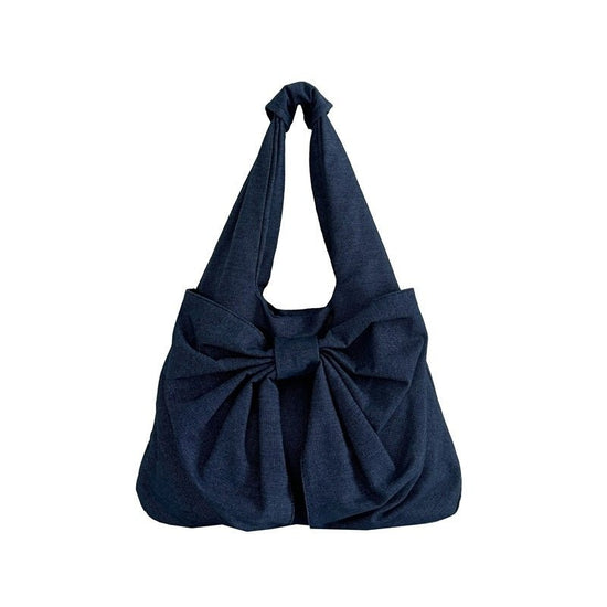 Large Capacity Bow Shoulder Underarm Tote Bag Washed Denim Canvas Bag $44.34 Dana Fashion Color: Beige Women's Bags Product information: Lining texture: polyester cotton Applicable scenario: Daily configuration Color: black, blue, Milky White, dark blue O