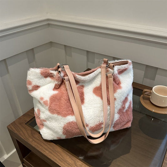 Large Capacity Fur Shoulder Tote Bag $25.00 Dana Fashion Color: Black Women's Bags Product information: Lining texture: polyester Color: black, brown, pink Hardness: medium and soft Material: Plush Suitcase shape: Horizontal Square Number of shoulder stra
