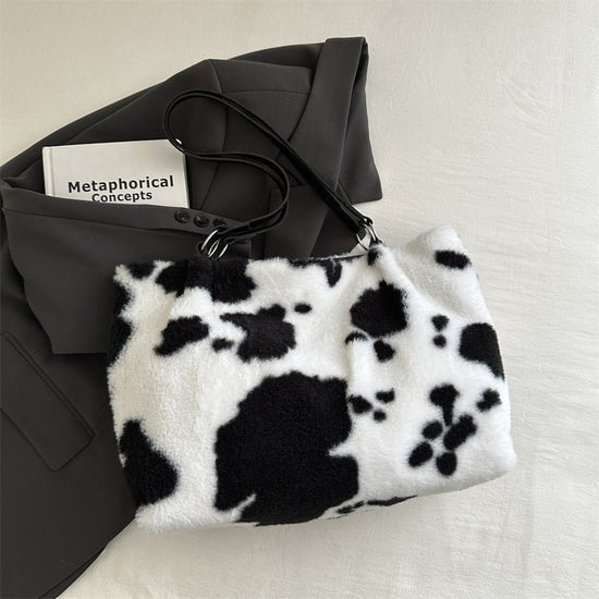 Large Capacity Fur Shoulder Tote Bag $25.00 Dana Fashion Color: Black Women's Bags Product information: Lining texture: polyester Color: black, brown, pink Hardness: medium and soft Material: Plush Suitcase shape: Horizontal Square Number of shoulder stra