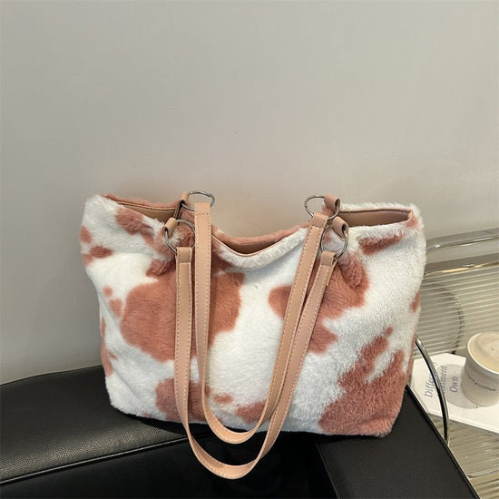 Large Capacity Fur Shoulder Tote Bag $25.00 Dana Fashion Color: Black Women's Bags Product information: Lining texture: polyester Color: black, brown, pink Hardness: medium and soft Material: Plush Suitcase shape: Horizontal Square Number of shoulder stra