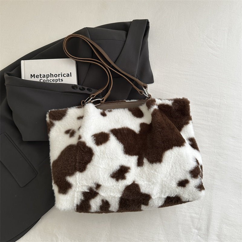 Large Capacity Fur Shoulder Tote Bag $25.00 Dana Fashion Color: Brown Women's Bags Product information: Lining texture: polyester Color: black, brown, pink Hardness: medium and soft Material: Plush Suitcase shape: Horizontal Square Number of shoulder stra