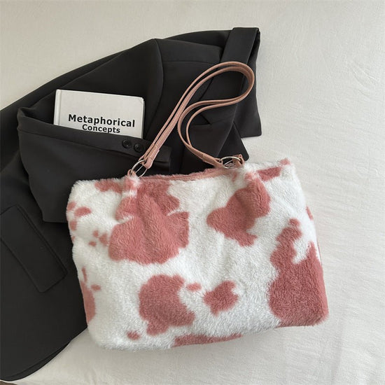 Large Capacity Fur Shoulder Tote Bag $25.00 Dana Fashion Color: Pink Women's Bags Product information: Lining texture: polyester Color: black, brown, pink Hardness: medium and soft Material: Plush Suitcase shape: Horizontal Square Number of shoulder strap