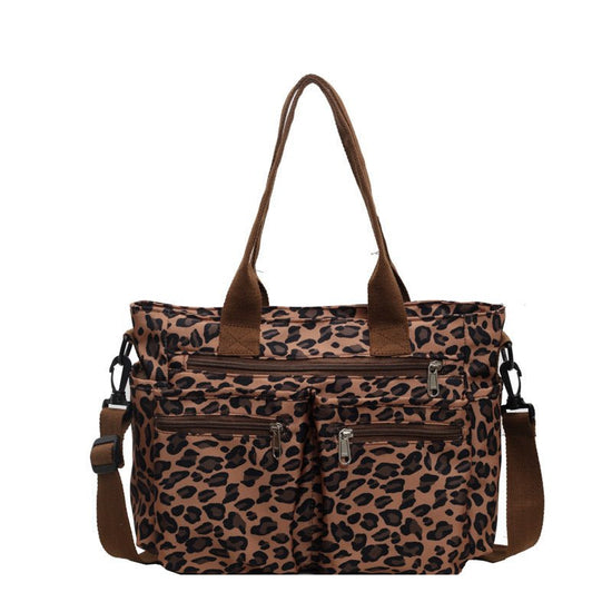 Large Capacity Leopard Print All-match Shoulder Messenger Bag $57.65 Dana Fashion Color: Beige Women's Bags Product information: Lining texture: Polyester Applicable scenario: Daily configuration Color: brown, black, Milky White, pink Hardness: soft Mater