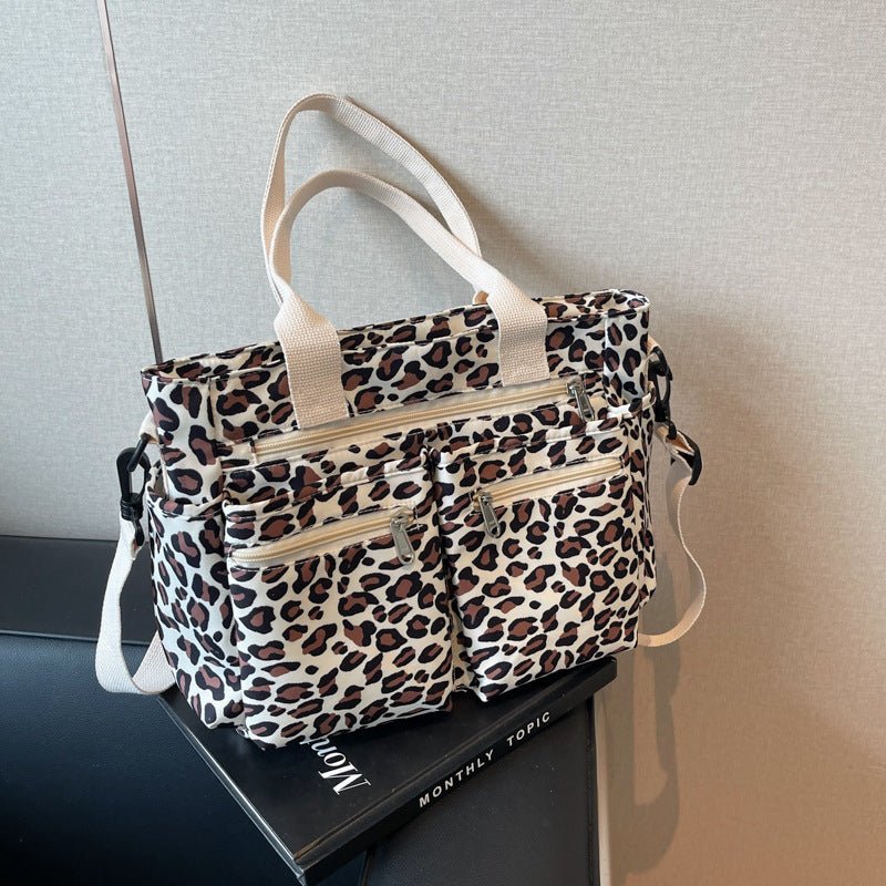 Large Capacity Leopard Print All-match Shoulder Messenger Bag $57.65 Dana Fashion Color: Beige Women's Bags Product information: Lining texture: Polyester Applicable scenario: Daily configuration Color: brown, black, Milky White, pink Hardness: soft Mater