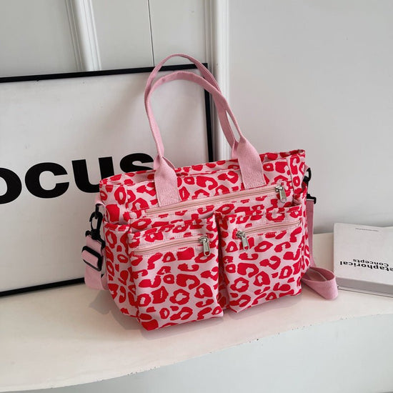 Large Capacity Leopard Print All-match Shoulder Messenger Bag $44.69 Dana Fashion Color: Pink Women's Bags Product information: Lining texture: Polyester Applicable scenario: Daily configuration Color: brown, black, Milky White, pink Hardness: soft Materi