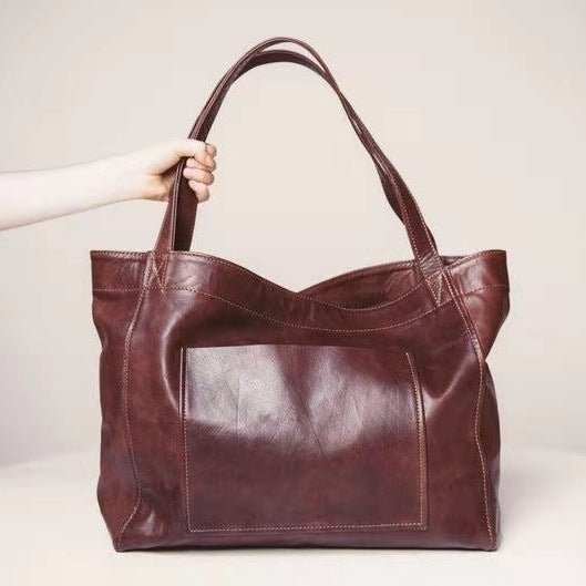 Large Capacity Oil Wax Tote Bags for Women Shoulder Bag $49.00 Dana Fashion Color: Reddish brown Women's Bags Product Information: Color: black, golden brown, reddish brown Style: European and American retro Material: PU Trendy Bags Style: Tote Bag Bag si