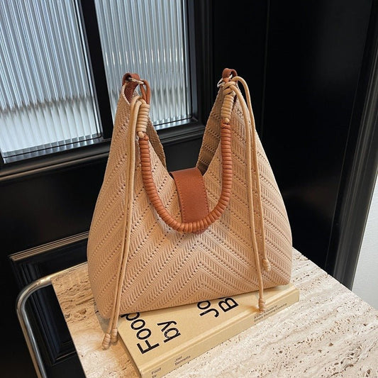 Large Capacity Underarm Tote Bag Commuting Large Bag $52.74 Dana Fashion Color: Black Women's Bags Product information: Lining texture: Polyester Applicable scenario: Daily configuration Color: black, khaki, Milky White Outer bag type: None Hardness: medi