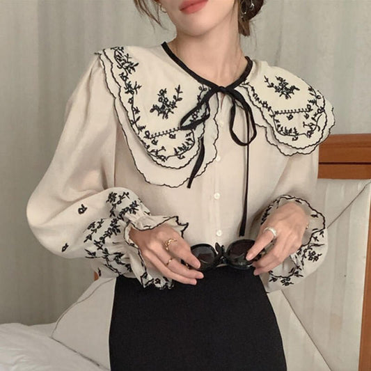 Large Lapel Single-breasted Loose Bell Sleeve Shirt $69.50 Dana Fashion Color: Apricot Size: Free Size Women's clothing Product information: Fabric name: Cotton Color: apricot, Black Sleeve type: bell sleeve Size: free size Version: Loose Length: common s