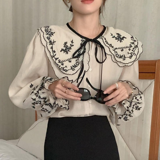 Large Lapel Single-breasted Loose Bell Sleeve Shirt $69.50 Dana Fashion Color: Apricot Size: Free Size Women's clothing Product information: Fabric name: Cotton Color: apricot, Black Sleeve type: bell sleeve Size: free size Version: Loose Length: common s
