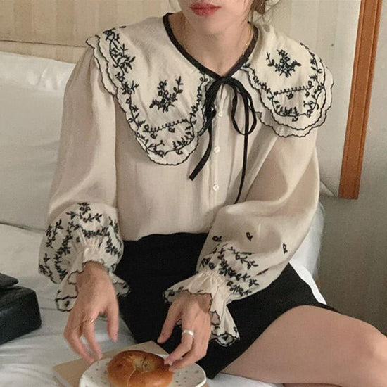 Large Lapel Single-breasted Loose Bell Sleeve Shirt $69.50 Dana Fashion Color: Apricot Size: Free Size Women's clothing Product information: Fabric name: Cotton Color: apricot, Black Sleeve type: bell sleeve Size: free size Version: Loose Length: common s