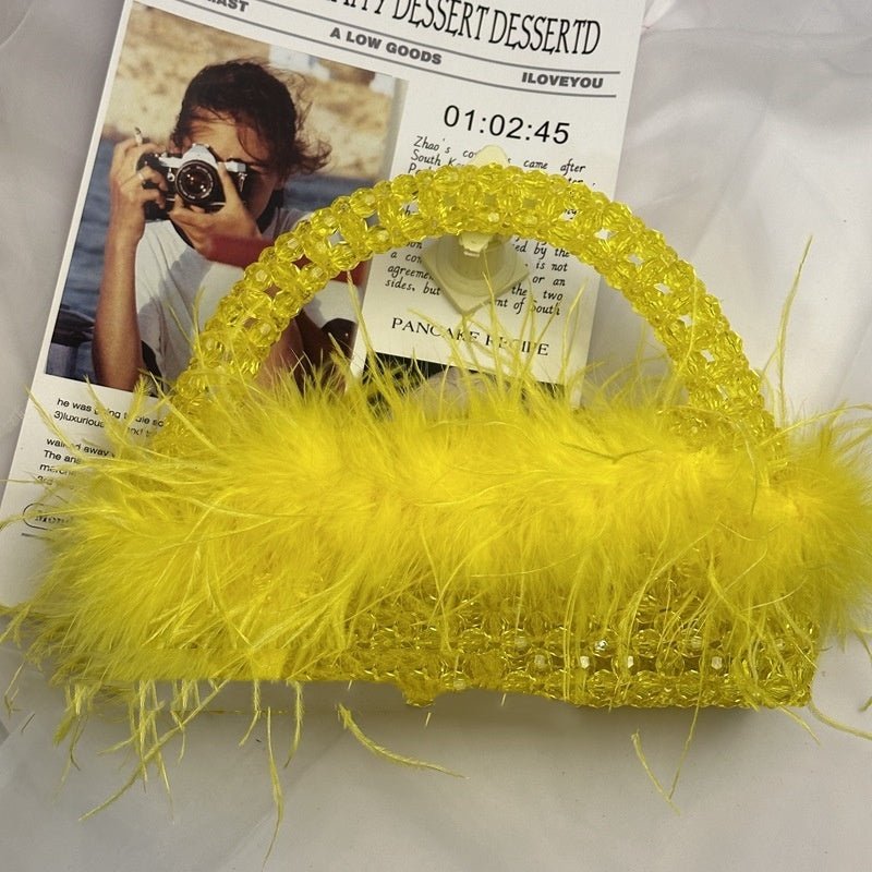 Large Ostrich Feather Handmade Beaded Fall Winter Fashion Feather Handbag $79.50 Dana Fashion Color: Yellow Size: 22X9X7.5 Women's Bags Product information: Lining texture: no lining Applicable scenario: Daily configuration Color: glittering, green, black