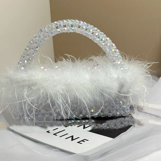 Large Ostrich Feather Handmade Beaded Fall Winter Fashion Feather Handbag $79.50 Dana Fashion Color: Bling Size: 22X9X7.5 Women's Bags Product information: Lining texture: no lining Applicable scenario: Daily configuration Color: glittering, green, black,