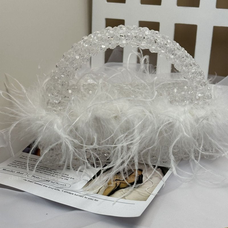 Large Ostrich Feather Handmade Beaded Fall Winter Fashion Feather Handbag $79.50 Dana Fashion Color: Transparent Color Size: 22X9X7.5 Women's Bags Product information: Lining texture: no lining Applicable scenario: Daily configuration Color: glittering, g