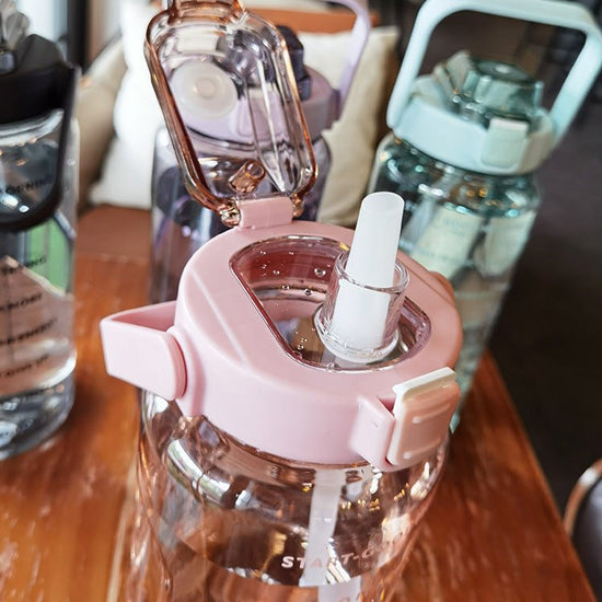 Large Plastic Cup Portable Water Bottle $45.50 Dana Fashion Color: Black Capacity size: 2000ML Dana's Kitchen Product infor mation: Product category: Large capacity water cup S tyle: Japanese Function: Environmental protection Structure: Single layer Patt