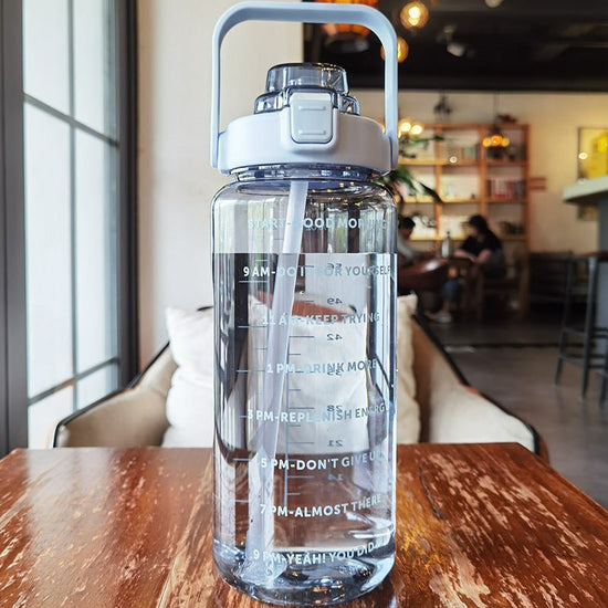 Large Plastic Cup Portable Water Bottle $45.50 Dana Fashion Color: Blue Capacity size: 2000ML Dana's Kitchen Product infor mation: Product category: Large capacity water cup S tyle: Japanese Function: Environmental protection Structure: Single layer Patte
