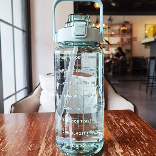 Large Plastic Cup Portable Water Bottle $45.50 Dana Fashion Color: Green Capacity size: 2000ML Dana's Kitchen Product infor mation: Product category: Large capacity water cup S tyle: Japanese Function: Environmental protection Structure: Single layer Patt