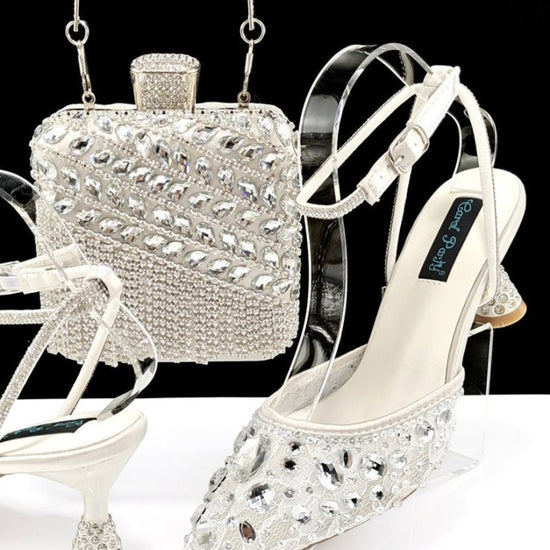 Large Rhinestone High Heel Sandals Three-dimensional Tassel Handbag Set $179.50 Dana Fashion Color: White Size: 38 Women's shoes Product information: Toe holder shape: Pointed Color: purple, white, green, Rose Red, Red, Brown, champagne, sky blue Shoe Upp