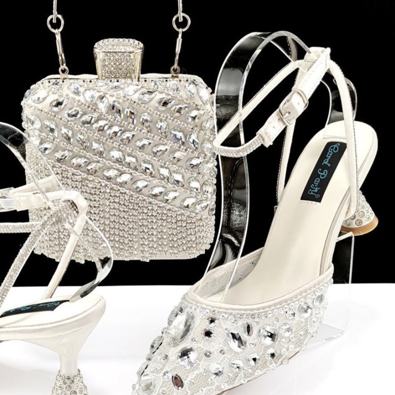 Large Rhinestone High Heel Sandals Three-dimensional Tassel Handbag Set $179.50 Dana Fashion Color: White Size: 38 Women's shoes Product information: Toe holder shape: Pointed Color: purple, white, green, Rose Red, Red, Brown, champagne, sky blue Shoe Upp
