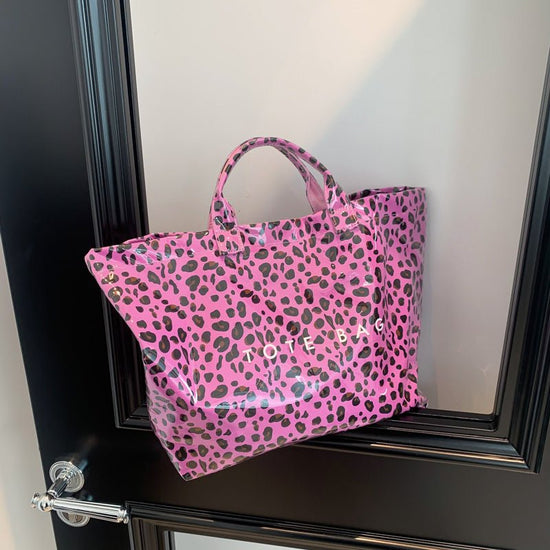 Larte Tote Leopard Handbag, Transparent PVC Beach Bag For Gym, Pool, And Travel With Inner Zipper Pocket $167.56 Dana Fashion Color: Black Women's Bags