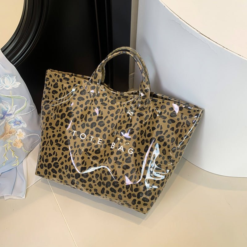 Larte Tote Leopard Handbag, Transparent PVC Beach Bag For Gym, Pool, And Travel With Inner Zipper Pocket $167.56 Dana Fashion Color: Yellow Women's Bags