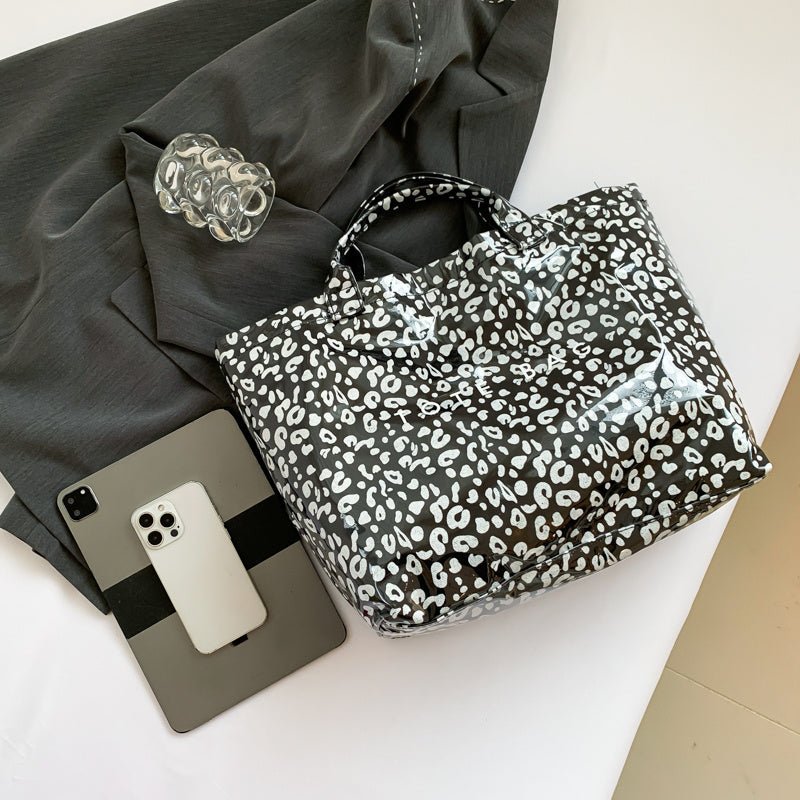 Larte Tote Leopard Handbag, Transparent PVC Beach Bag For Gym, Pool, And Travel With Inner Zipper Pocket $167.56 Dana Fashion Color: Black Women's Bags