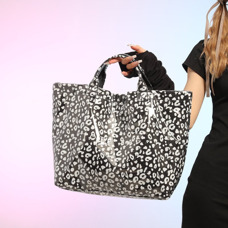 Larte Tote Leopard Handbag, Transparent PVC Beach Bag For Gym, Pool, And Travel With Inner Zipper Pocket $167.56 Dana Fashion Color: Black Women's Bags