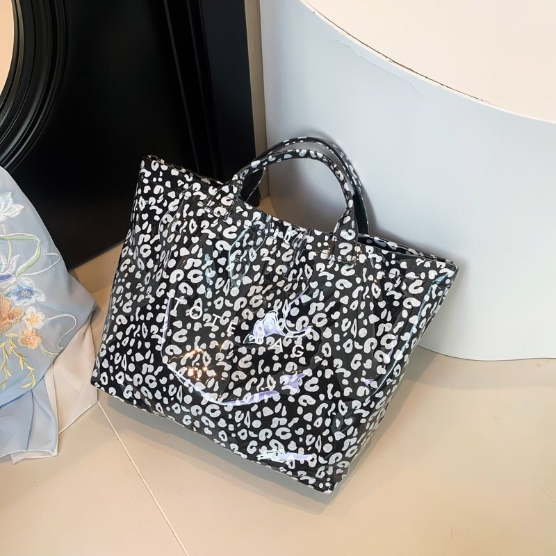 Larte Tote Leopard Handbag, Transparent PVC Beach Bag For Gym, Pool, And Travel With Inner Zipper Pocket $167.56 Dana Fashion Color: Black Women's Bags