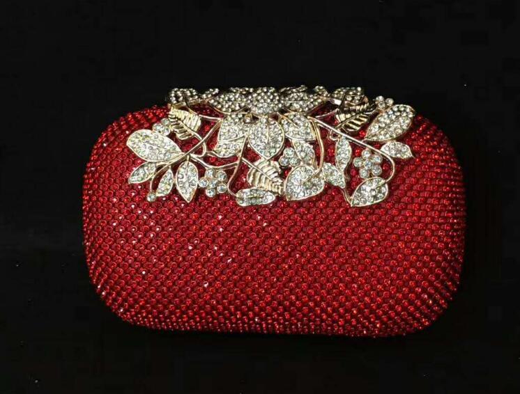 Leaf-shaped Flowers Diamond Dinner Clutch $66.86 Dana Fashion Color: Black Women's Bags Product information: Lining texture: Satin Pattern: leaves with diamonds Color: red, black, gold, silver, colorful crystal gold Bag Size: 16cm * 5cm * 12cm (manual mea
