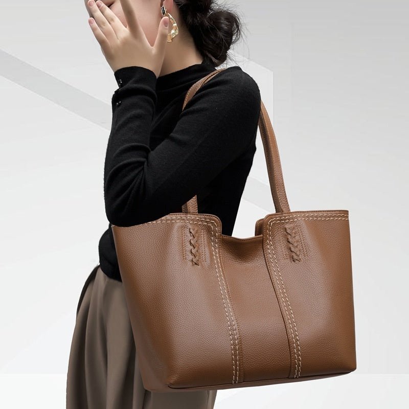 Leather Bag For Woman New Women's Tote Bag $146.50 Dana Fashion Color: Black Women's Bags Product information: Lining texture: Polyester Applicable scenarios: Daily configuration Color: khaki, Black Outer bag type: slit pocket Leather features: two-layer