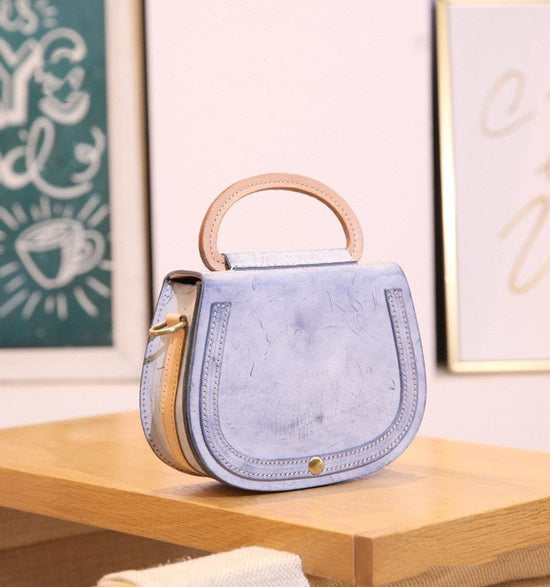 Leather Handmade Vintage Handbag Cowhide $79.00 Dana Fashion Color: Morning and evening blue Women's Bags Product information: Material: leather For: Ladies Keywords: Ladies shoulder bag Weight: 440 g Color: blue, pink, yellow, green, coffee Size: height