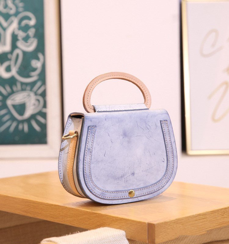 Leather Handmade Vintage Handbag Cowhide $79.00 Dana Fashion Color: Morning and evening blue Women's Bags Product information: Material: leather For: Ladies Keywords: Ladies shoulder bag Weight: 440 g Color: blue, pink, yellow, green, coffee Size: height