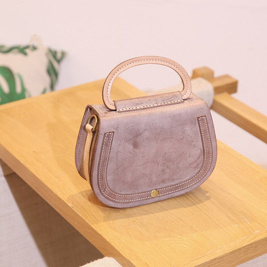Leather Handmade Vintage Handbag Cowhide $79.00 Dana Fashion Color: Mellow Coffee Women's Bags Product information: Material: leather For: Ladies Keywords: Ladies shoulder bag Weight: 440 g Color: blue, pink, yellow, green, coffee Size: height 15cm width