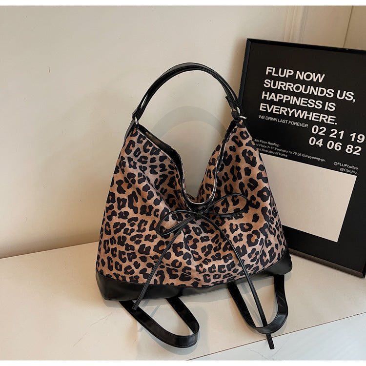 Leopard Print Personality Large Capacity Fashion Backpack Three-purpose $25.11 Dana Fashion Color: Brown Women's Bags Product information: Lining texture: Polyester Applicable scenario: Daily configuration Color: Brown, Brown Outer bag type: Sandwich pock