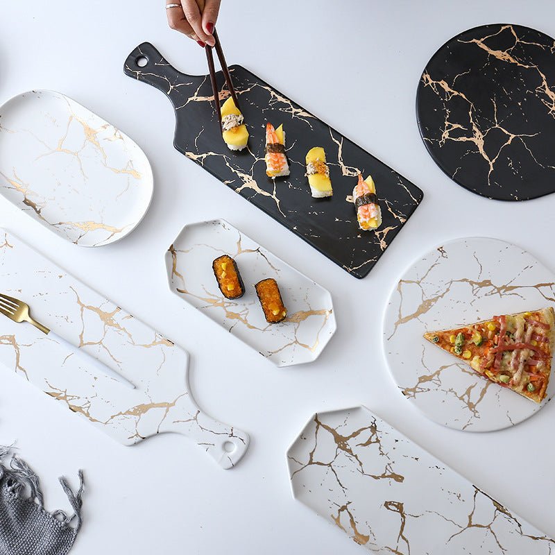 Light luxury style marble and gold irregular ceramic tray $57.78 Dana Fashion Color: 10Style Dana's Kitchen Product name: Nordic marble gold cracked tray Commodity technology: high temperature firing Product material: ceramic Note: The ceramic products ar