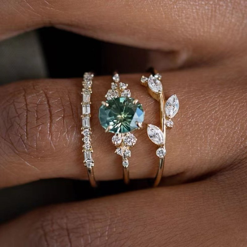 Light Luxury Temperament Flower Ring Three-piece Ring Set $14.52 Dana Fashion Color: Green Diamond Size: No 10 Women's Accessories Product information: Type: Ring, ring Treatment Process: Electroplating Color: lvzuan three-piece set Applicable population: