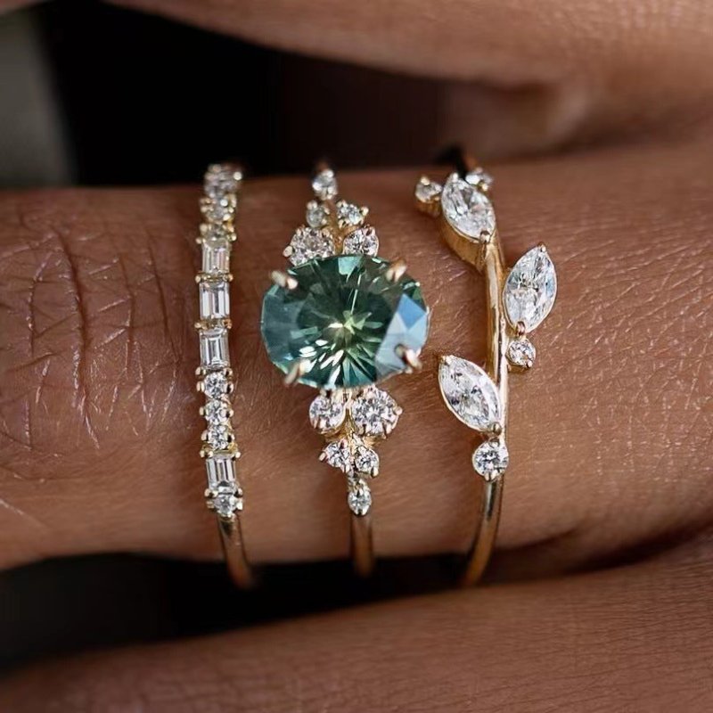 Light Luxury Temperament Flower Ring Three-piece Ring Set $14.52 Dana Fashion Color: Green Diamond Size: No 10 Women's Accessories Product information: Type: Ring, ring Treatment Process: Electroplating Color: lvzuan three-piece set Applicable population: