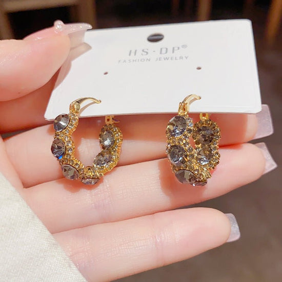 Light Luxury Unique Elegance Retro Opal Circle Ear Clip $19.99 Dana Fashion Color: Gray Women's Accessories Product information: Treatment Process: real gold plating Color: Pink Opal circle ear clip (thick real gold plating), Gray zircon circle ear clip (