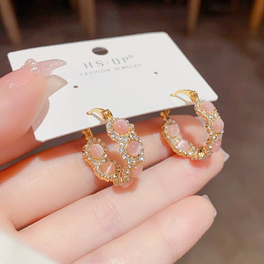 Light Luxury Unique Elegance Retro Opal Circle Ear Clip $19.99 Dana Fashion Color: Gray Women's Accessories Product information: Treatment Process: real gold plating Color: Pink Opal circle ear clip (thick real gold plating), Gray zircon circle ear clip (