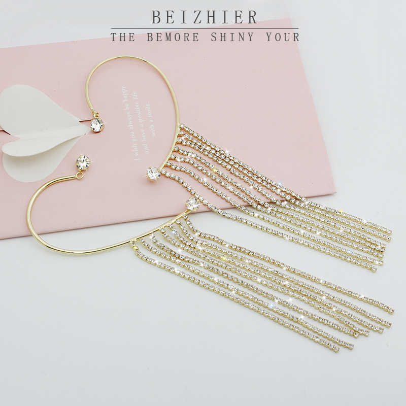 Long Chain Tassel Ear Hook Ear Clip $39.00 Dana Fashion Color: Golden Tassels Pair Women's Accessories Product information: Treatment Process: Electroplating Color: gold, silver Applicable population: Female Style: Women's Shapes: Geometry Popular element