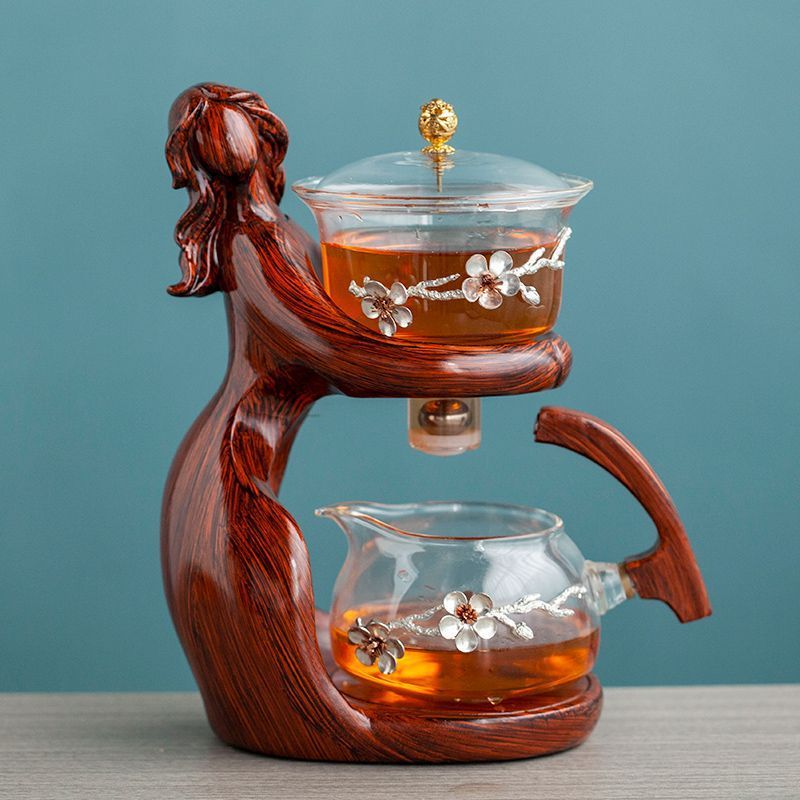 Maid Semi-automatic Tea Set Tea Making Kungfu Teapot Automatic Tea Set Heat-resistant Glass Holder Base Tea Infusers Tea Ware $197.50 Dana Fashion Color: Style5 Dana's Kitchen Overview: MATERIAL: This glass teapot set is made of durable borosilicate glass