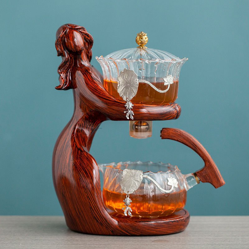 Maid Semi-automatic Tea Set Tea Making Kungfu Teapot Automatic Tea Set Heat-resistant Glass Holder Base Tea Infusers Tea Ware $197.50 Dana Fashion Color: Style8 Dana's Kitchen Overview: MATERIAL: This glass teapot set is made of durable borosilicate glass