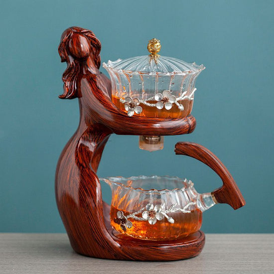 Maid Semi-automatic Tea Set Tea Making Kungfu Teapot Automatic Tea Set Heat-resistant Glass Holder Base Tea Infusers Tea Ware $197.50 Dana Fashion Color: Style6 Dana's Kitchen Overview: MATERIAL: This glass teapot set is made of durable borosilicate glass
