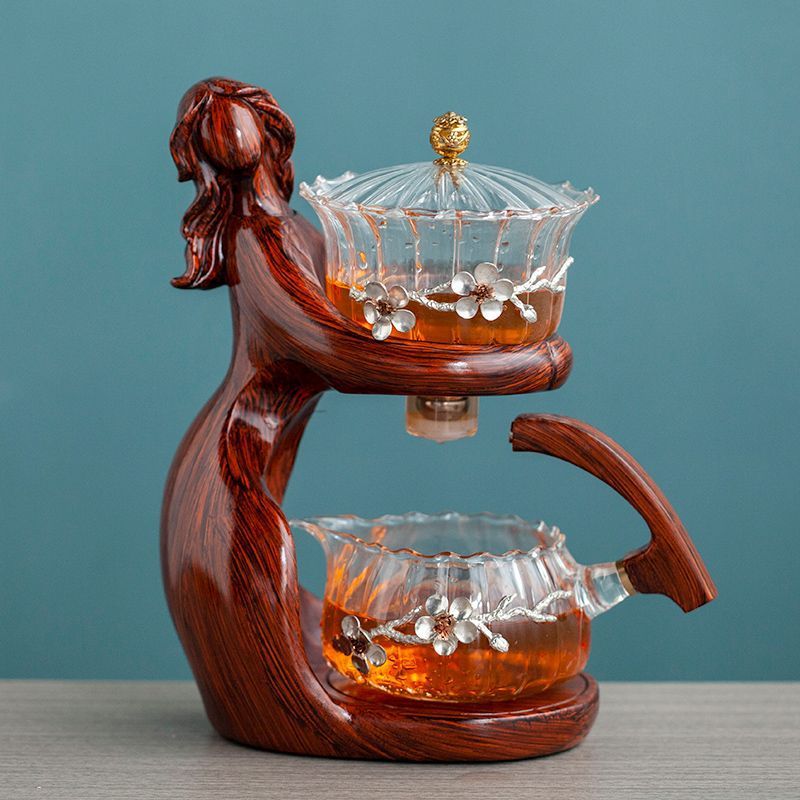 Maid Semi-automatic Tea Set Tea Making Kungfu Teapot Automatic Tea Set Heat-resistant Glass Holder Base Tea Infusers Tea Ware $197.50 Dana Fashion Color: Style6 Dana's Kitchen Overview: MATERIAL: This glass teapot set is made of durable borosilicate glass
